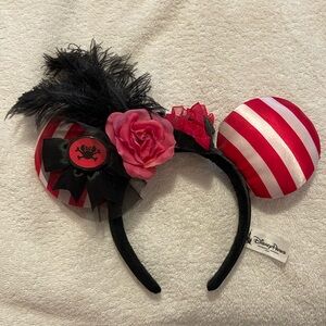 Disney parks pirate ears with feather plume. No longer sold smoke-free home.